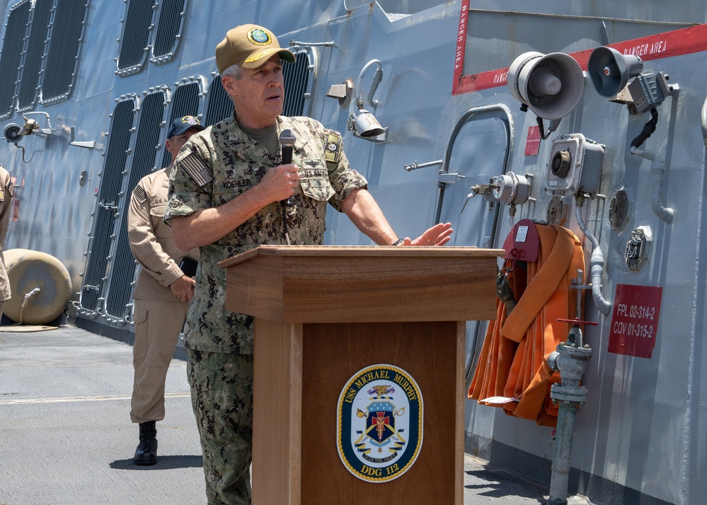 Adm. Steve Koehler, commander, U.S. Pacific Fleet, presents the Arleigh Burke Trophy Award to USS Michael Murphy