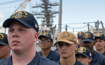 Adm. Steve Koehler, commander, U.S. Pacific Fleet, presents the Arleigh Burke Trophy Award to USS Michael Murphy