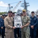 Adm. Steve Koehler, commander, U.S. Pacific Fleet, presents the Arleigh Burke Trophy Award to USS Michael Murphy