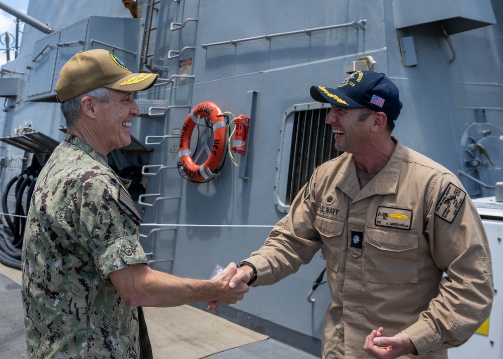 Adm. Steve Koehler, commander, U.S. Pacific Fleet, presents the Arleigh Burke Trophy Award to USS Michael Murphy