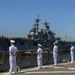 USS PEARL HARBOR (LSD 52) Sailors man the rails as the ship departs for Pacific Partnership 2025