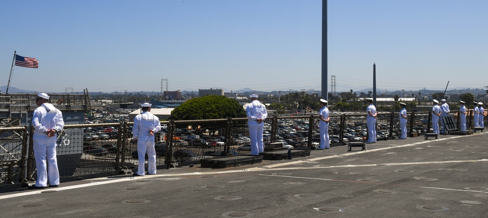 USS PEARL HARBOR (LSD 52) Sailors man the rails as the ship departs for Pacific Partnership 2025