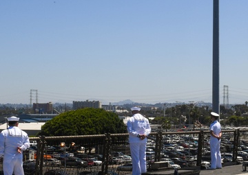 USS PEARL HARBOR (LSD 52) Sailors man the rails as the ship departs for Pacific Partnership 2025