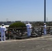 USS PEARL HARBOR (LSD 52) Sailors man the rails as the ship departs for Pacific Partnership 2025