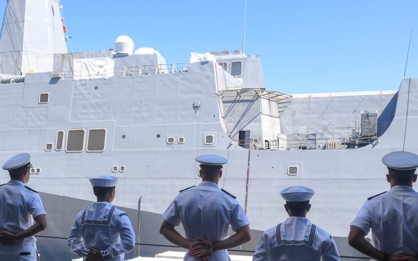 USS PEARL HARBOR (LSD 52) Sailors man the rails as the ship departs for Pacific Partnership 2025