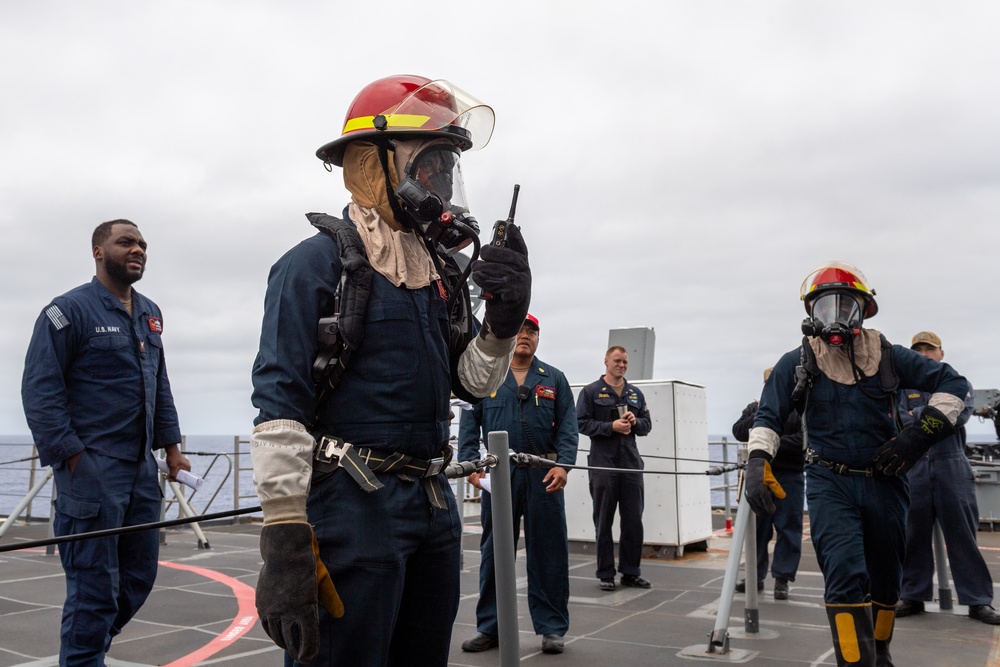 USS PEARL HARBOR (LSD 52) Sailors perform general quarters drill