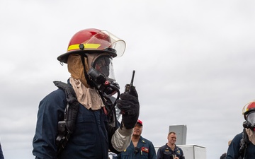 USS PEARL HARBOR (LSD 52) Sailors perform general quarters drill