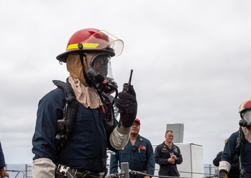 USS PEARL HARBOR (LSD 52) Sailors perform general quarters drill