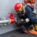 USS PEARL HARBOR (LSD 52) Sailors perform general quarters drill