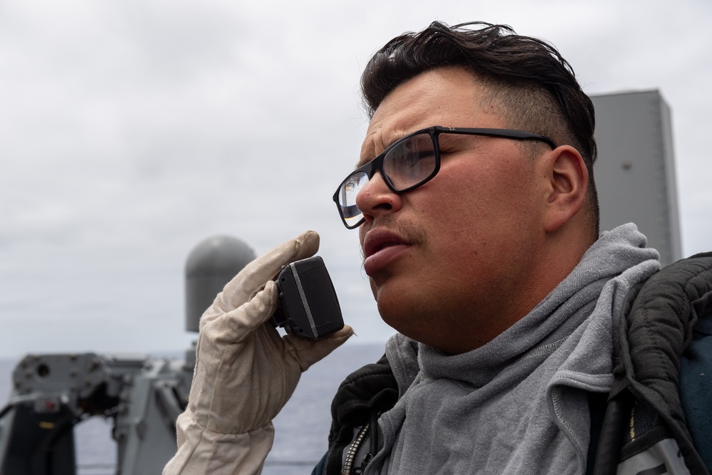 USS PEARL HARBOR (LSD 52) Sailors perform general quarters drill