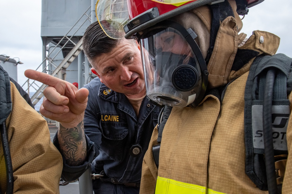 USS PEARL HARBOR (LSD 52) Sailors perform general quarters drill
