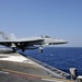 U.S. Navy Fighter Jet Launches from Aircraft Carrier in Persian Gulf to Support Operations in Iraq