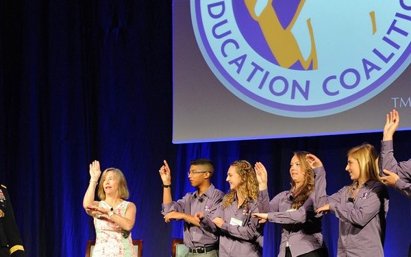 Dempsey and Wife Sing with Military Children at Education Seminar