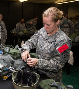 U.S. Army's First Female Airborne Communications Unit Command Sergeant Major Prepares for Jump