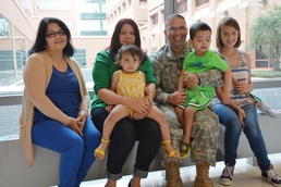 Collado Family Poses for Photo at San Antonio Military Medical Center
