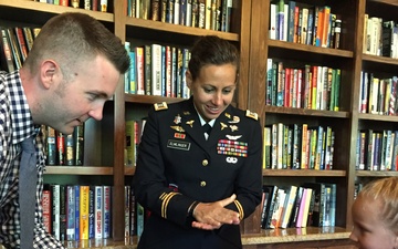 Army Nurse Celebrates Promotion with Daughter and Former Colleague