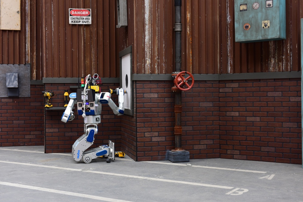 Team Kaist's Robot Wins DARPA Robotics Challenge with Wall-Cutting Tool