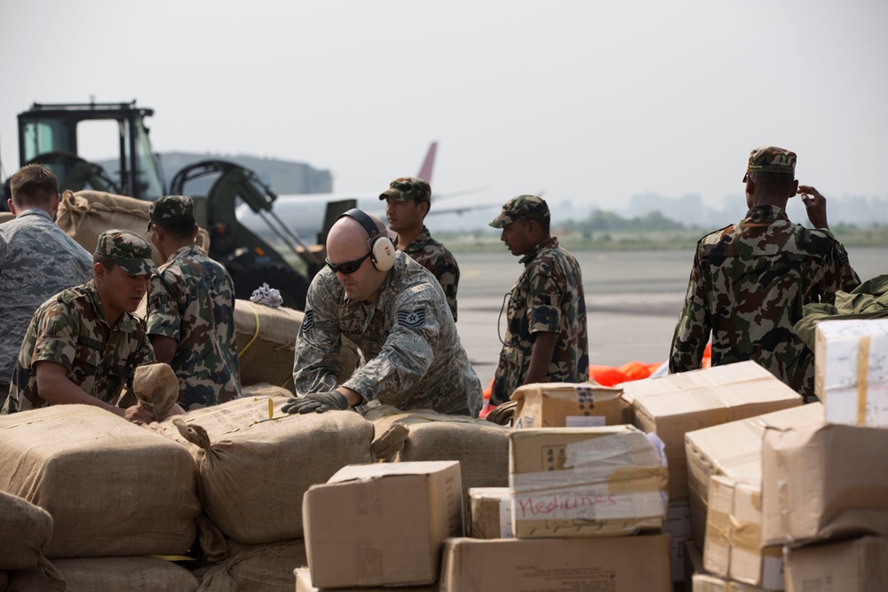 U.S. Airmen, Nepalese Troops Offload Humanitarian Aid After Earthquake