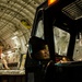 Air Force Airman Operates Cargo Loader on C-17 Globemaster III