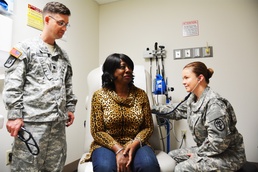 Army Medical Team Examines Patient at Brooke Army Medical Center