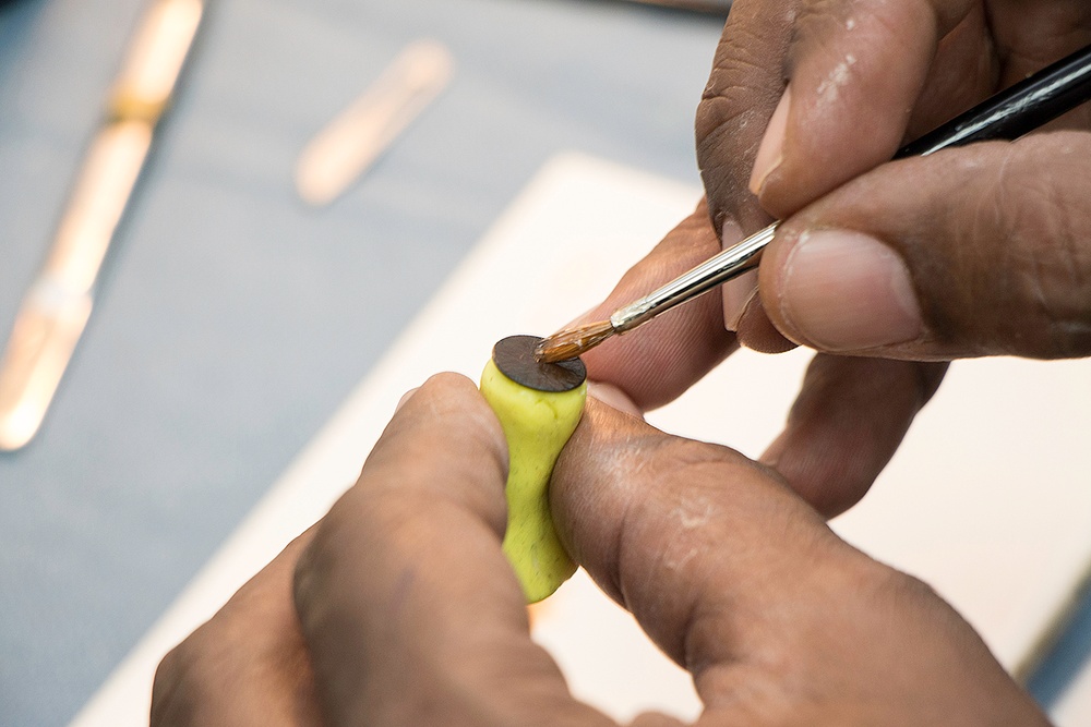Navy Retiree Paints Prosthetic Eye at Walter Reed Medical Center