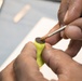 Navy Retiree Paints Prosthetic Eye at Walter Reed Medical Center