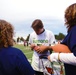 Former NFL Quarterback Jake Plummer Signs Footballs for Wounded Veterans