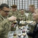 Volunteer Distributes Donated Cupcakes to Troops at Bagram Airfield