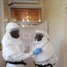 Liberian Lab Technicians Suit Up to Test Samples
