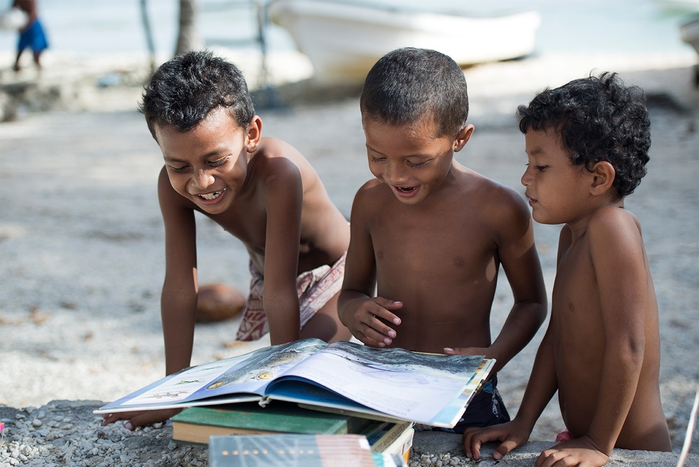 Children Receive Gifts from Operation Christmas Drop in Micronesia
