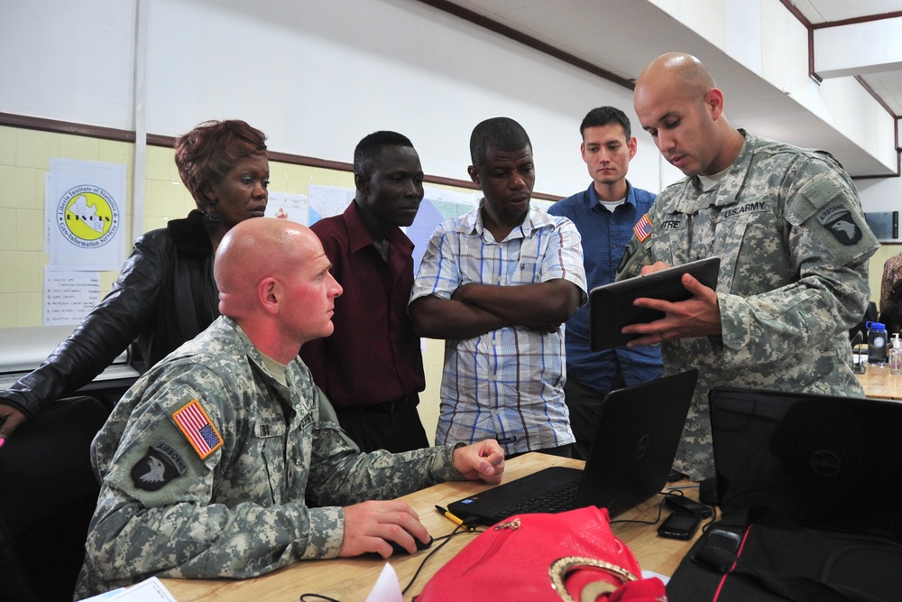 Army Warrant Officer Explains Geospatial Data Exchange to Liberian Counterparts