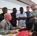 Army Warrant Officer Explains Geospatial Data Exchange to Liberian Counterparts