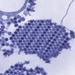 Chikungunya Virus Particles Revealed in Electron Micrograph