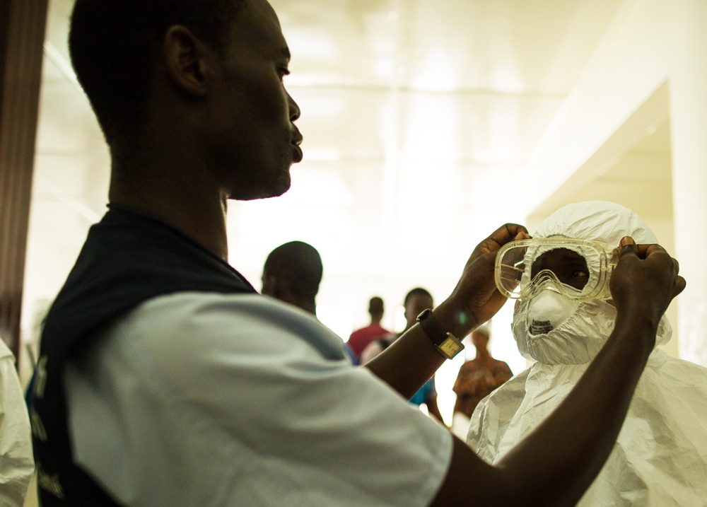 Health Workers Suit Up to Battle Ebola in Liberia