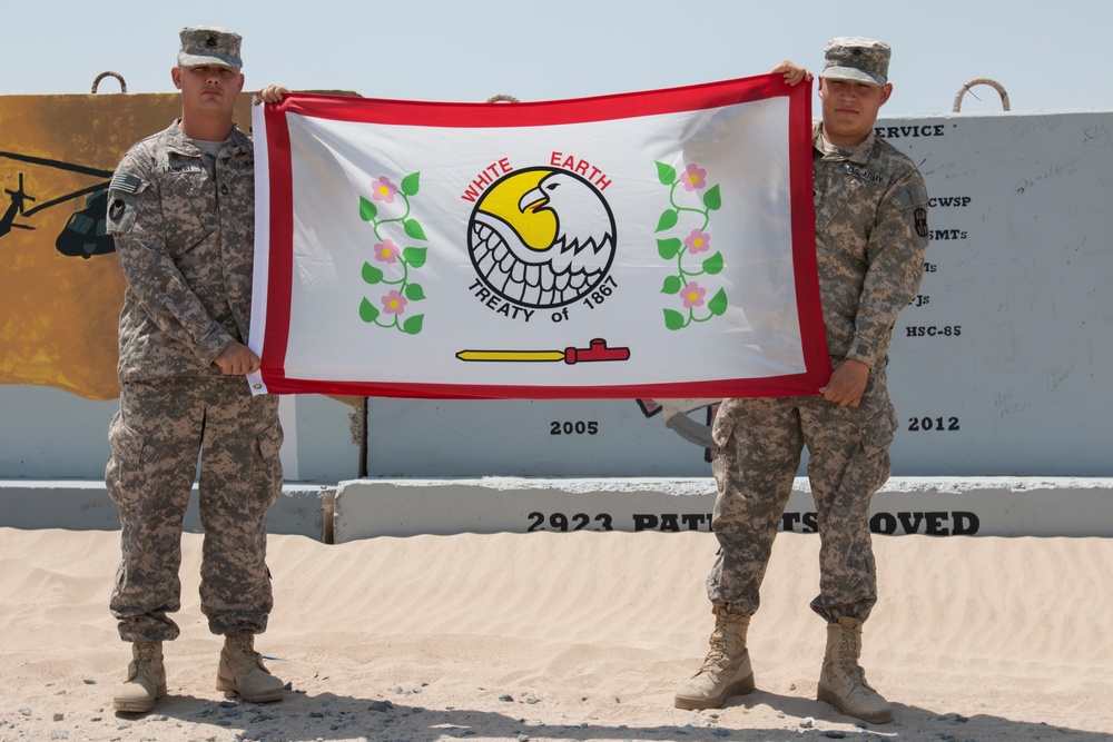 Minnesota National Guard Brothers Display Tribal Flag During Kuwait Deployment