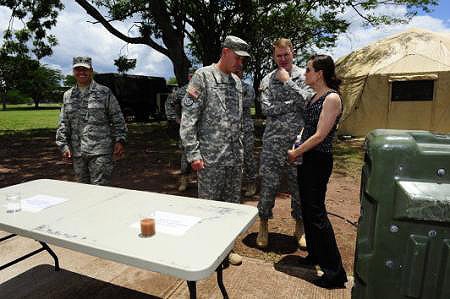 U.S. Army Sergeant Demonstrates Water Purification System to Defense Official in Honduras