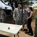U.S. Army Sergeant Demonstrates Water Purification System to Defense Official in Honduras