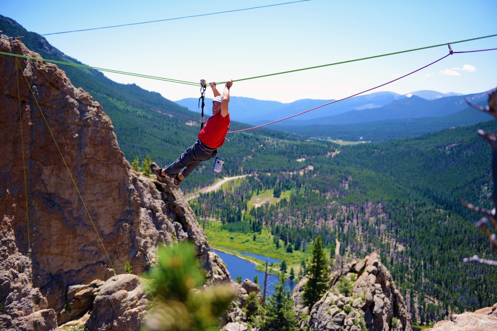 Navy Veteran Experiences Tyrolean Traverse at USO Rock Climbing Camp