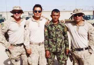 U.S. Marines and Afghan Soldier Pose Together in Afghanistan