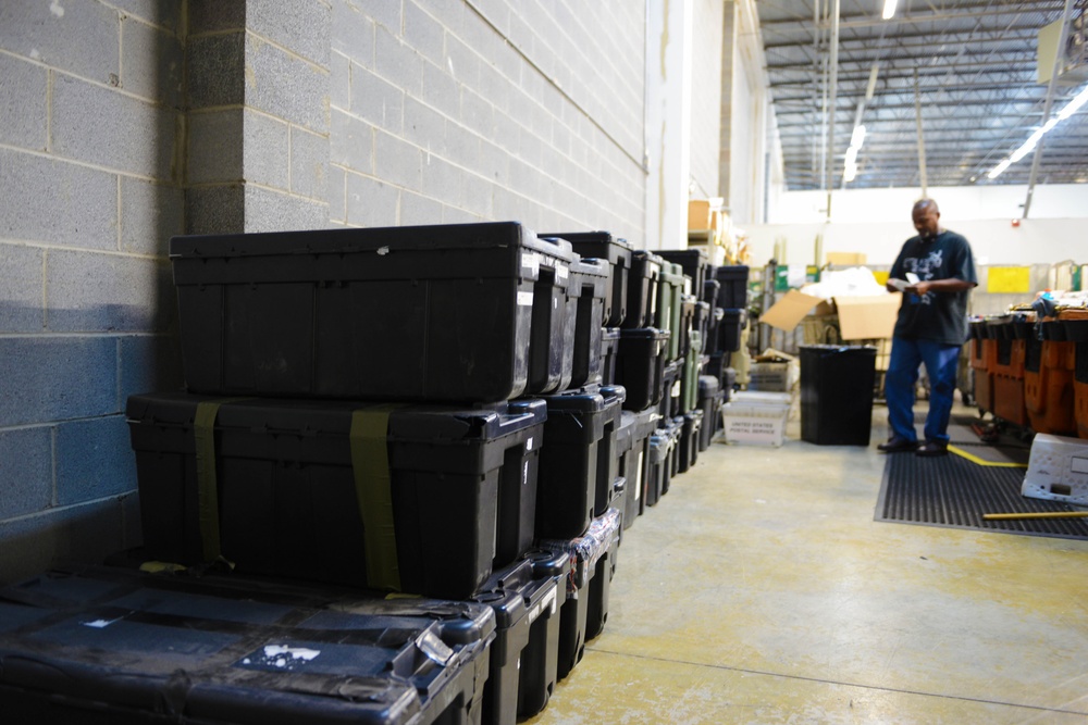 Unclaimed Military Gear Fills Postal Recovery Center