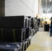 Unclaimed Military Gear Fills Postal Recovery Center