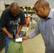 Postal Workers Demonstrate Mail Recovery Procedures