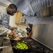 Air Force Airman Prepares Monterey Chicken at Moody Air Force Base