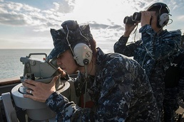 Navy Sailors Scan Horizon During Port Visit to Romania