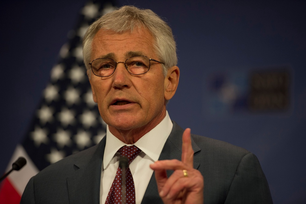 Hagel Holds News Conference at NATO Headquarters