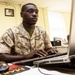 Marine Checks Morning Accountability Report at Camp Lejeune