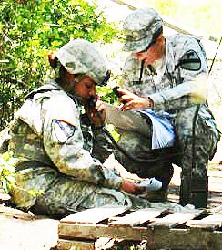 Miami Native Medic Calls in Simulated Evacuation Report During Expert Field Medical Badge Test