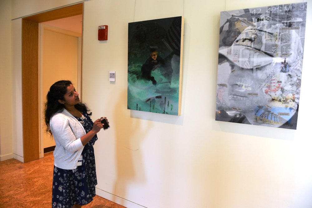 Art Therapist Explains Wounded Warriors' Artwork at USO Center