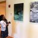 Art Therapist Explains Wounded Warriors' Artwork at USO Center