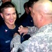 Army Officer Pins Navy Son with Surface Warfare Badge After Family Cruise